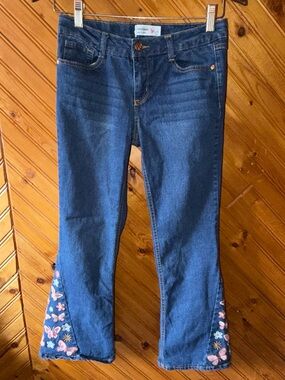 Butterfly and flower embroidered bell bottom jeans sz Y14